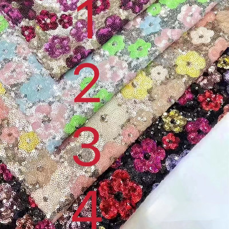 O atacadista de renda revela o tecido de lantejoulas novas para figurinos de meninas e mulheres